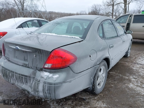 2002 Ford Taurus SE Standard with VIN 1FAFP53U92G153588, listed as a IAAI auction lot 41589338 with 57,856 mi miles and . Bid and sale history available at DreamBid. Image 3.