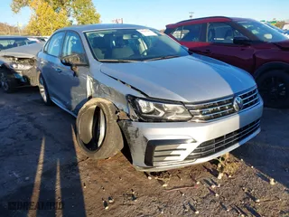 2018 Volkswagen Passat 2.0T S with VIN 1VWAA7A32JC027278, listed as a IAAI auction lot 40910163 with 121,251 mi miles. Bid and sale history available at carsss.com. Image 1.