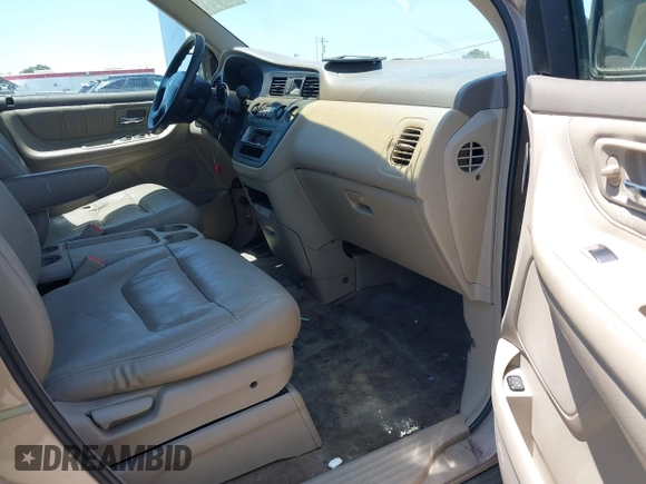 2003 Honda Odyssey EX-L with VIN 5FNRL18993B127164, listed as a IAAI auction lot 42474080 with 152,838 mi miles and . Bid and sale history available at DreamBid. Image 5.
