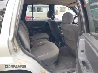 2001 Jeep Grand Cherokee Laredo z VIN 1J4GW48S01C658017, wystawiony jako IAAI lot #42160310 z przebiegiem 220 309 mil mil oraz . Historia ofert i sprzedaży dostępna na DreamBid. Obrazek 8.
