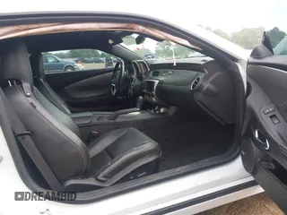 2014 Chevrolet Camaro LT z VIN 2G1FC1E39E9245413, wystawiony jako IAAI lot #42080811 z przebiegiem 88 584 mil mil oraz . Historia ofert i sprzedaży dostępna na DreamBid. Obrazek 5.