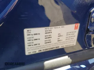 2017 Tesla Model S 100D с VIN 5YJSA1E28HF213023, выставлен на аукционе Copart как лот 50136795 с пробегом Не указан миль и Списание • Salvage title. История ставок и продаж доступна на DreamBid. Изображение 12.