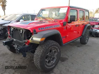 2022 Jeep Wrangler Unlimited Rubicon with VIN 1C4JJXR63NW206709, listed as a IAAI auction lot 41254820 with 25,317 mi miles and . Bid and sale history available at DreamBid. Image 23.