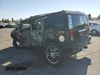 2003 Hummer H2 with VIN 5GRGN23U83H134284, listed as a Copart auction lot 70259154 with 0 mi miles and Salvage Title. Bid and sale history available at carsss.com. Image 2.