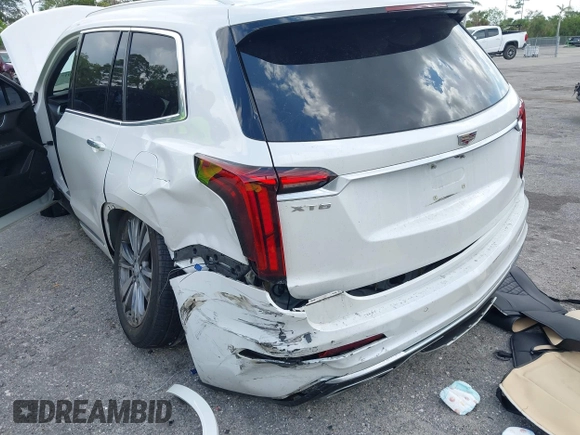 2020 Cadillac XT6 FWD Premium Luxury with VIN 1GYKPCRS6LZ193579, listed as a IAAI auction lot 42367917 with 39,647 mi miles and . Bid and sale history available at DreamBid. Image 6.