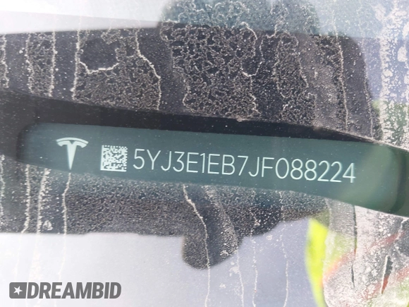 2018 Tesla Model 3 Long Range Battery z VIN 5YJ3E1EB7JF088224, wystawiony jako IAAI lot #42097665 z przebiegiem Nie podano mil oraz . Historia ofert i sprzedaży dostępna na DreamBid. Obrazek 9.