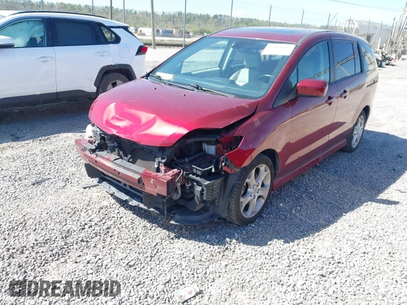2010 Mazda 5 Sport with VIN JM1CR2WL6A0389227, listed as a IAAI auction lot 42031801 with 100,652 mi miles. Bid and sale history available at carsss.com. Image 2.