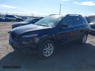2014 Jeep Cherokee Latitude with VIN 1C4PJMCS6EW145810, listed as a IAAI auction lot 41802031 with 143,358 mi miles. Bid and sale history available at carsss.com. Image 18.