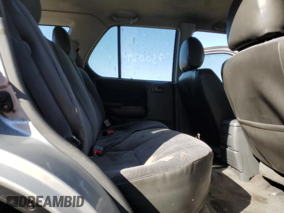 2001 Honda Passport LX z VIN 4S6CK58WX14410363, wystawiony jako Copart lot #77500294 z przebiegiem 195 272 mil mil oraz Czysty tytuł • Clean title. Historia ofert i sprzedaży dostępna na DreamBid. Obrazek 11.