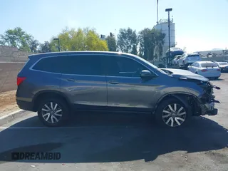 2021 Honda Pilot EX with VIN 5FNYF5H35MB036402, listed as a IAAI auction lot 42280114 with Not provided miles and . Bid and sale history available at DreamBid. Image 13.