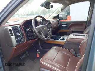 2016 Chevrolet Silverado 1500 High Country with VIN 3GCUKTEC5GG131060, listed as a IAAI auction lot 41108622 with 138,372 mi miles and . Bid and sale history available at DreamBid. Image 5.