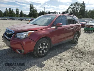 2014 Subaru Forester XT Touring with VIN JF2SJGMC0EH513844, listed as a Copart auction lot 61162355 with 56,887 mi miles and Salvage title. Bid and sale history available at DreamBid. Image 1.