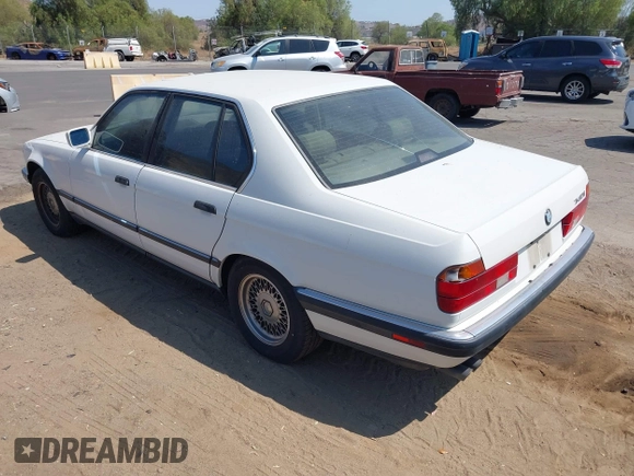 1994 BMW 7 Series z VIN WBAGD4324RDE65491, wystawiony jako IAAI lot #42761773 z przebiegiem 141 762 mil mil oraz . Historia ofert i sprzedaży dostępna na DreamBid. Obrazek 3.