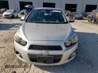 2012 Chevrolet Sonic LTZ z VIN 1G1JE6SH4C4101608, wystawiony jako Copart lot #53111725 z przebiegiem 203 012 mil mil oraz Szkoda całkowita • Salvage title. Historia ofert i sprzedaży dostępna na DreamBid. Obrazek 5.