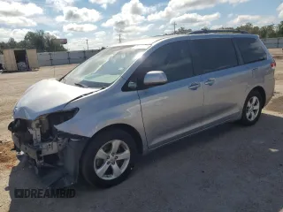 2013 Toyota Sienna LE with VIN 5TDJK3DC9DS066652, listed as a Copart auction lot 69123844 with 176,679 mi miles and Salvage Title. Bid and sale history available at carsss.com. Image 1.