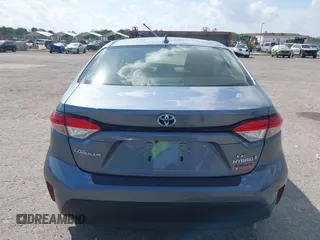 2023 Toyota Corolla Hybrid LE with VIN JTDBCMFE8PJ010693, listed as a IAAI auction lot 41736641 with 10,751 mi miles. Bid and sale history available at carsss.com. Image 17.