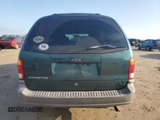 1999 Ford Windstar LX with VIN 2FMZA5143XBB18373, listed as a Copart auction lot 74350754 with 234,594 mi miles and Clean Title. Bid and sale history available at carsss.com. Image 6.