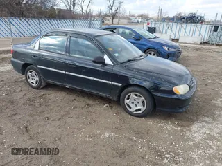 1998 Kia Spectra z VIN KNAFB1213W5727495, wystawiony jako IAAI lot #41676077 z przebiegiem 144 538 mil mil oraz . Historia ofert i sprzedaży dostępna na DreamBid. Obrazek 1.
