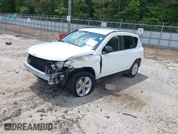 2016 Jeep Compass Sport with VIN 1C4NJCBA0GD742797, listed as a IAAI auction lot 42177186 with 128,665 mi miles and . Bid and sale history available at DreamBid. Image 2.