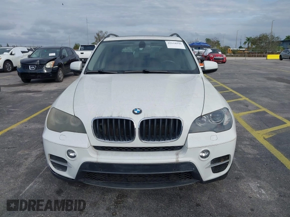 2011 BMW X5 35i with VIN 5UXZV4C54BL412770, listed as a IAAI auction lot 41618946 with 148,612 mi miles. Bid and sale history available at carsss.com. Image 6.