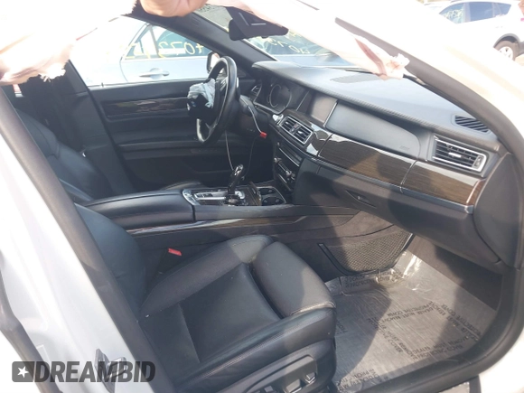 2015 BMW 7 Series 750Li xDrive with VIN WBAYF8C56FD654765, listed as a IAAI auction lot 40734550 with 133,848 mi miles and . Bid and sale history available at carsss.com. Image 5.