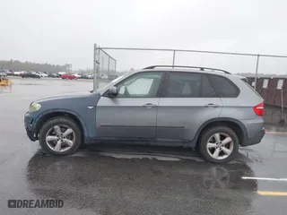 2009 BMW X5 30i with VIN 5UXFE43579L271366, listed as a IAAI auction lot 41831724 with 129,107 mi miles. Bid and sale history available at carsss.com. Image 14.