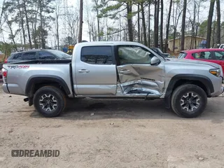 2022 Toyota Tacoma SR with VIN 3TMCZ5ANXNM497511, listed as a IAAI auction lot 41670710 with 26,277 mi miles and . Bid and sale history available at DreamBid. Image 13.