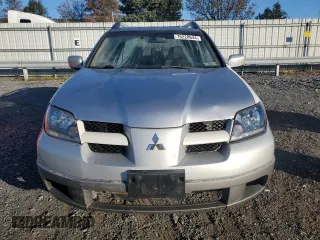 2004 Mitsubishi Outlander LS with VIN JA4LZ31F74U028300, listed as a Copart auction lot 76228644 with 174,424 mi miles and Salvage Title. Bid and sale history available at carsss.com. Image 5.