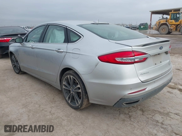2019 Ford Fusion Titanium with VIN 3FA6P0D9XKR206465, listed as a IAAI auction lot 41577306 with 70,668 mi miles. Bid and sale history available at carsss.com. Image 3.