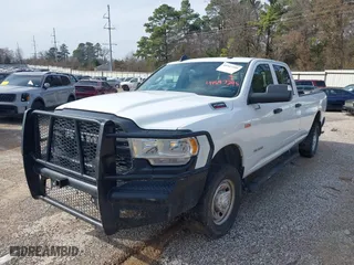 2022 Ram 2500 Tradesman with VIN 3C6UR5HJXNG251538, listed as a IAAI auction lot 41547395 with 129,142 mi miles. Bid and sale history available at carsss.com. Image 2.