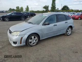2007 Ford Focus S with VIN 1FAFP37N77W337626, listed as a Copart auction lot 70451294 with 174,068 mi miles and Salvage Title. Bid and sale history available at carsss.com. Image 1.