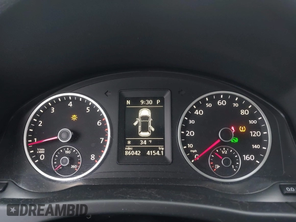 2011 Volkswagen Tiguan SE with VIN WVGBV7AX2BW513647, listed as a IAAI auction lot 41660772 with 86,042 mi miles and . Bid and sale history available at DreamBid. Image 7.