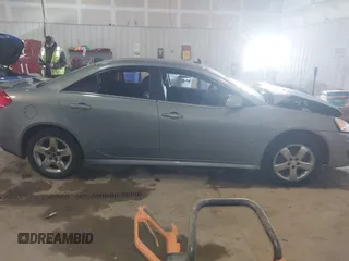 2009 Pontiac G6 1SB with VIN 1G2ZJ57B894237824, listed as a IAAI auction lot 41731113 with 144,914 mi miles and . Bid and sale history available at DreamBid. Image 13.