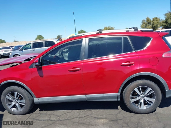 2016 Toyota RAV4 XLE with VIN 2T3WFREV3GW239632, listed as a IAAI auction lot 41860727 with 135,850 mi miles. Bid and sale history available at carsss.com. Image 14.