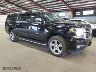 2017 Chevrolet Suburban Premier with VIN 1GNSKJKC9HR161803, listed as a Copart auction lot 54561745 with 360,375 mi miles and Clean Title. Bid and sale history available at carsss.com. Image 4.