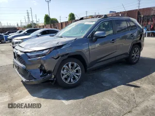 2023 Toyota RAV4 Hybrid XLE Premium z VIN JTMB6RFV5PD080395, wystawiony jako Copart lot #54899515 z przebiegiem 9 190 mil mil oraz Szkoda całkowita • Salvage title. Historia ofert i sprzedaży dostępna na DreamBid. Obrazek 1.