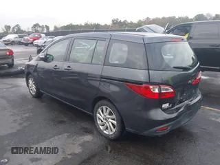 2015 Mazda 5 Sport with VIN JM1CW2BL3F0188052, listed as a IAAI auction lot 40777036 with 69,405 mi miles. Bid and sale history available at carsss.com. Image 3.