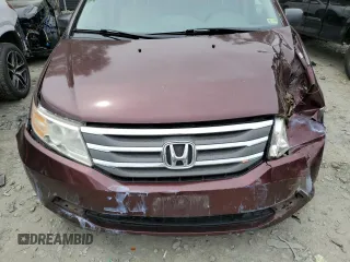 2011 Honda Odyssey LX z VIN 5FNRL5H29BB057920, wystawiony jako Copart lot #56433905 z przebiegiem 143 551 mil mil oraz Szkoda całkowita • Salvage title. Historia ofert i sprzedaży dostępna na DreamBid. Obrazek 12.