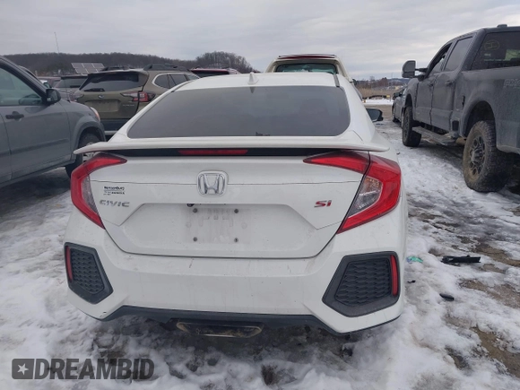 2018 Honda Civic Si with VIN 2HGFC1E50JH706377, listed as a IAAI auction lot 41384413 with 76,115 mi miles and . Bid and sale history available at DreamBid. Image 17.