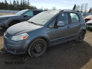 2009 Suzuki SX4 Man Touring Pkg AWD with VIN JS2YB417396203304, listed as a Copart auction lot 45118845 with 332,231 mi miles and Clean Title. Bid and sale history available at carsss.com. Image 1.