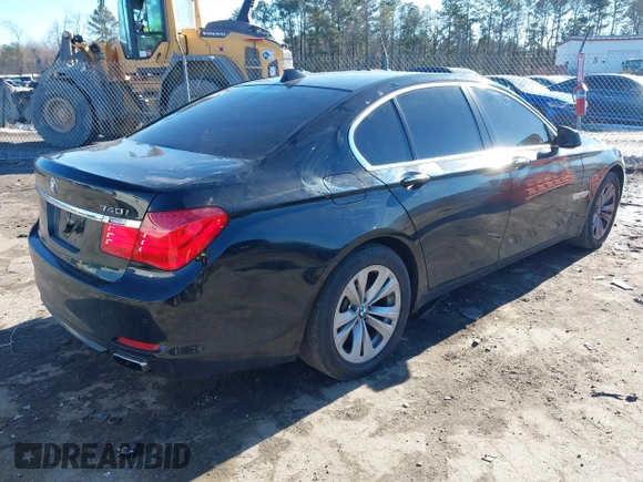 2011 BMW 7 Series 740i with VIN WBAKA4C58BC392020, listed as a IAAI auction lot 41314751 with 116,553 mi miles. Bid and sale history available at carsss.com. Image 4.