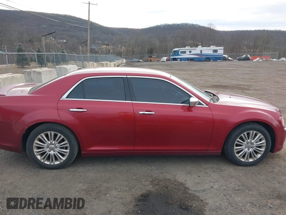 2012 Chrysler 300 C with VIN 2C3CCAKT4CH217217, listed as a IAAI auction lot 41502473 with 193,258 mi miles and . Bid and sale history available at DreamBid. Image 13.