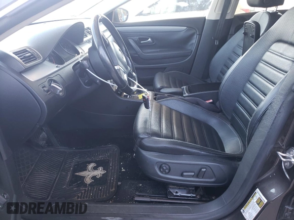 2014 Volkswagen CC R-Line with VIN WVWBP7AN1EE520189, listed as a Copart auction lot 75035404 with 65,421 mi miles and Salvage Title. Bid and sale history available at carsss.com. Image 7.