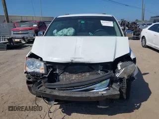 2015 Chrysler Town & Country Touring L with VIN 2C4RC1CG9FR547098, listed as a IAAI auction lot 42135624 with 61,364 mi miles and . Bid and sale history available at DreamBid. Image 13.