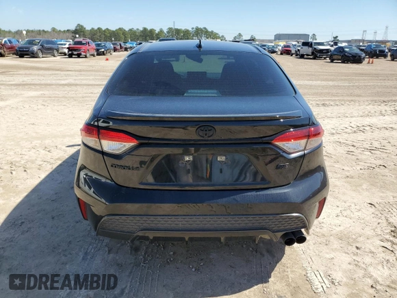 2022 Toyota Corolla SE with VIN 5YFS4MCE7NP126008, listed as a Copart auction lot 46907645 with 26,999 mi miles and Salvage Title. Bid and sale history available at DreamBid. Image 6.
