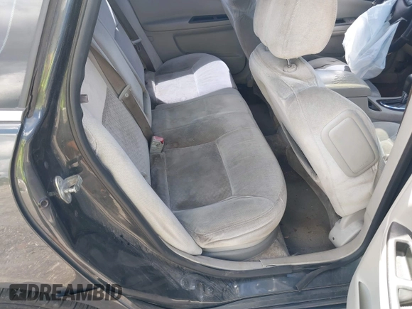 2014 Chevrolet Impala LT with VIN 2G1WB5E31E1146318, listed as a IAAI auction lot 40413281 with 422,345 mi miles and . Bid and sale history available at DreamBid. Image 8.