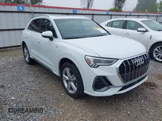 2022 Audi Q3 S line Premium Plus z VIN WA1EECF39N1035349, wystawiony jako IAAI lot #42084351 z przebiegiem 28 198 mil mil oraz . Historia ofert i sprzedaży dostępna na DreamBid. Obrazek 1.