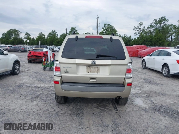2011 Mercury Mariner z VIN 4M2CN8B72BKJ03915, wystawiony jako IAAI lot #42358251 z przebiegiem 169 206 mil mil oraz . Historia ofert i sprzedaży dostępna na DreamBid. Obrazek 16.