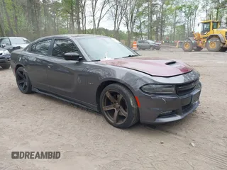 2015 Dodge Charger RT with VIN 2C3CDXCT3FH730588, listed as a IAAI auction lot 42023763 with 118,634 mi miles and . Bid and sale history available at DreamBid. Image 1.
