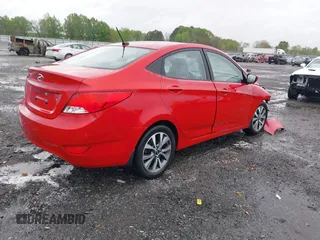 2015 Hyundai Accent GLS with VIN KMHCU4AE3FU806849, listed as a IAAI auction lot 41935761 with 147,784 mi miles. Bid and sale history available at carsss.com. Image 4.